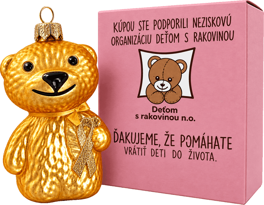 Zlatý sklenený medvedík so žltou stužkou vedľa krabičky s logom Deťom s rakovinou n. o.
